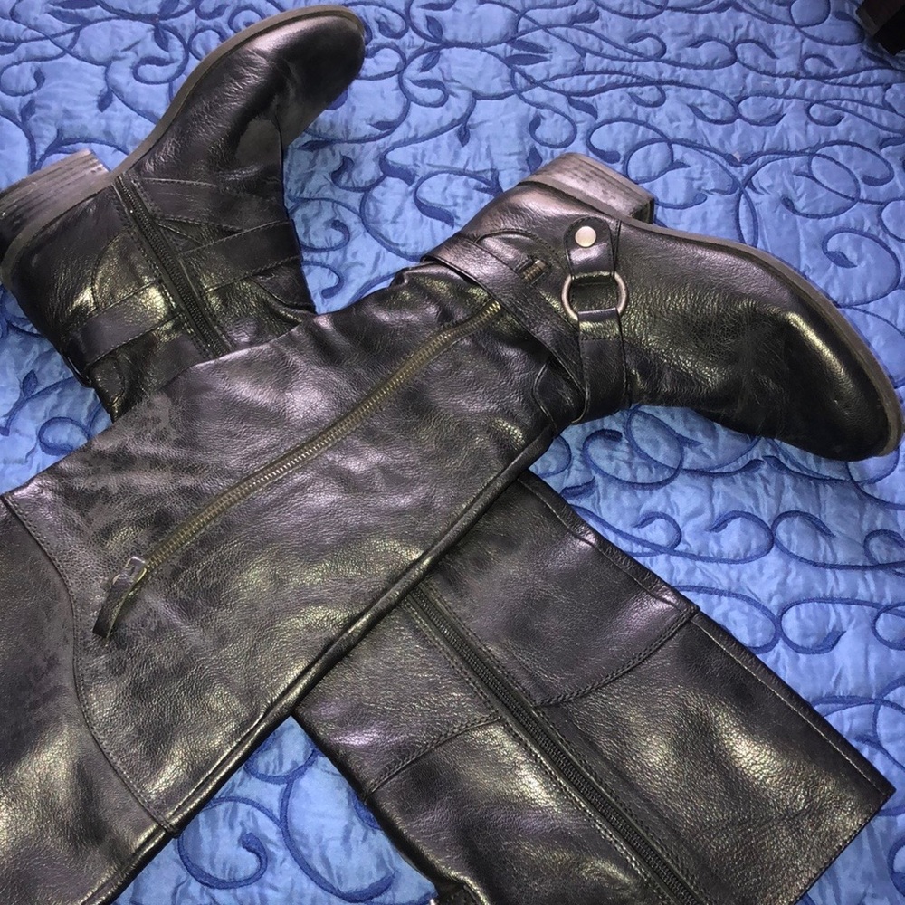 Pair of black leather over the knee boots.